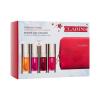 Clarins Lip Comfort Oil Radiant Lips Collection Darilni set olje za ustnice Lip Comfort Oil 7 ml 01 Honey + olje za ustnice Lip Comfort Oil 7 ml 02 Raspberry + olje za ustnice Lip Comfort Oil 7 ml 03 Cherry + olje za ustnice Lip Comfort Oil 7 ml 04 Pitaya + kozmetična torbica