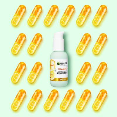 Garnier Skin Naturals Vitamin C Brightening Serum Cream SPF25 Serum za obraz za ženske 50 ml