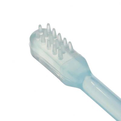 Canpol babies Baby Toothbrush Trainer Set Darilni set masažna ščetka 1 kos + gumijasta ščetka za čiščenje prvih zob 1 kos + zobna ščetka 1 kos