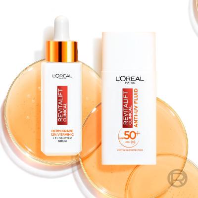 L&#039;Oréal Paris Revitalift Clinical Pure 12% Vitamin C Darilni set serum Revitalift Clinical Vitamin C Serum 30 ml + dnevna krema za obraz Revitalift Clinical Vitamin C Anti-UV Fluid SPF50 50 ml