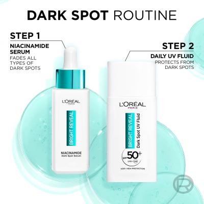 L&#039;Oréal Paris Bright Reveal Dark Spot UV Fluid SPF50+ Darilni set dnevni fluid za obraz Bright Reveal Dark Spot UV Fluid SPF50 50 ml + serum za obraz Bright Reveal Niacinamide Dark Spot Serum 30 ml