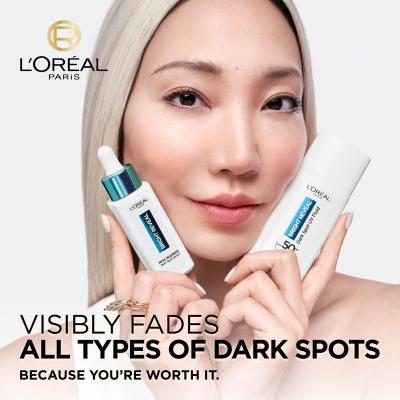 L&#039;Oréal Paris Bright Reveal Dark Spot UV Fluid SPF50+ Darilni set dnevni fluid za obraz Bright Reveal Dark Spot UV Fluid SPF50 50 ml + serum za obraz Bright Reveal Niacinamide Dark Spot Serum 30 ml