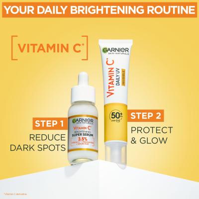 Garnier Skin Naturals Vitamin C Darilni set dnevni serum za obraz Skin Naturals Vitamin C Brightening Super Serum 30 ml + dnevni fluid za obraz Skin Naturals Vitamin C Daily UV Invisible SPF50 40 ml